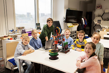 Image showing happy children with 3d printer at robotics school