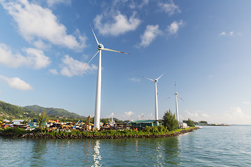 Image showing turbines at wind farm on sea shore