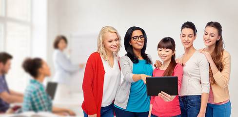 Image showing international group of happy women with tablet pc