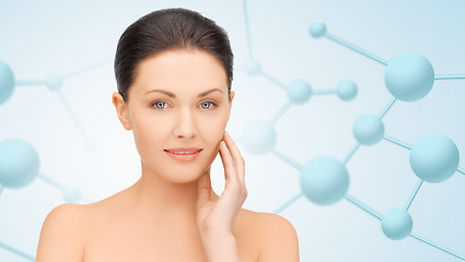 Image showing beautiful young woman face with molecules