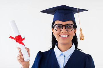 Image showing happy bachelor woman in mortarboard with diplomas