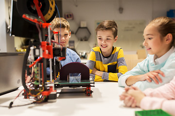 Image showing happy children with 3d printer at robotics school