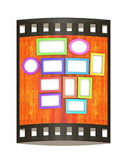 Image showing Mock up picture frames on wood wall. 3d illustration. The film s