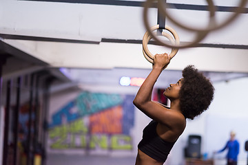 Image showing black woman doing dipping exercise