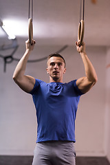 Image showing man doing dipping exercise