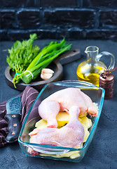 Image showing raw chicken legs and potato 