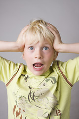 Image showing Portrait of a young boy shouting