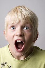 Image showing Portrait of a young boy shouting