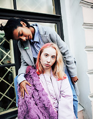 Image showing Two teenage girls infront of university building smiling, having