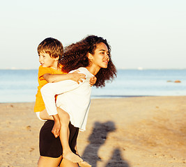 Image showing pretty diverse nation and age friends on sea coast having fun, lifestyle people concept on beach vacations close up