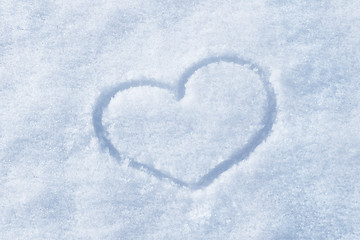 Image showing The shape of heart painted on the snow 