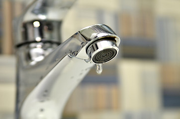 Image showing Bathroom tap leaking water drops