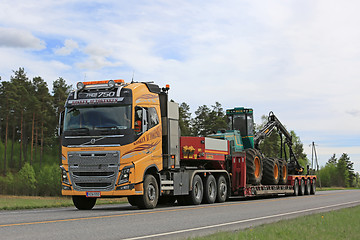 Image showing Yellow Volvo FH Transports Forestry Equipment