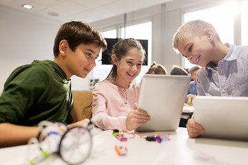 Image showing kids with tablet pc programming at robotics school