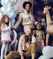 Image showing Lifestyle and people concept: young pretty diversity nations woman with different age children celebrating on birth day party together happy smiling, making selfie. African-american, asian and caucasi