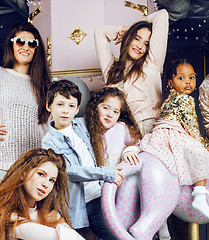 Image showing Lifestyle and people concept: young pretty diversity nations woman with different age children celebrating on birth day party together happy smiling, making selfie. African-american, asian and caucasi