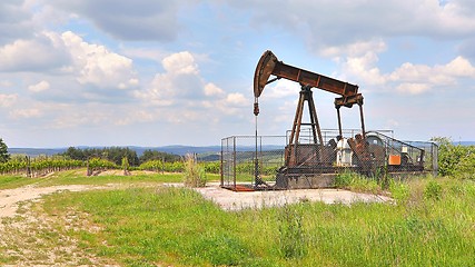 Image showing Oil well on a landscape