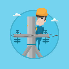 Image showing Electrician working on electric power pole.