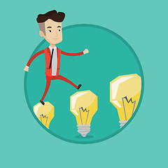 Image showing Businessman jumping on light bulbs.