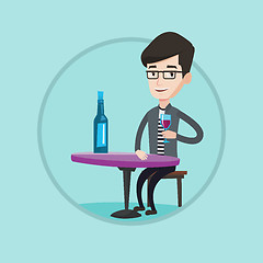 Image showing Man drinking wine at restaurant.
