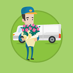 Image showing Delivery courier holding bouquet of flowers.