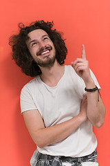 Image showing young man with funny hair over color background