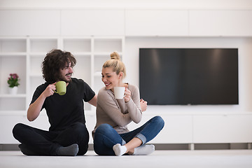 Image showing young couple in their new home