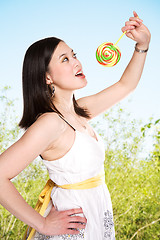 Image showing Woman and lollipop