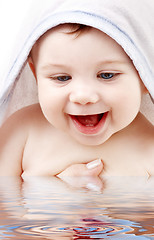 Image showing happy baby with terry hoodie robe on head