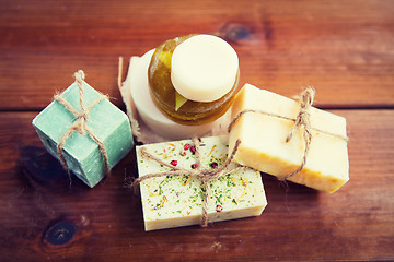 Image showing close up of handmade soap bars on wood