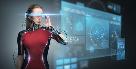 Image showing woman in virtual reality glasses and microchip