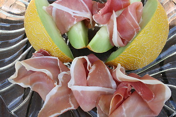 Image showing Serrano ham and Galia melon