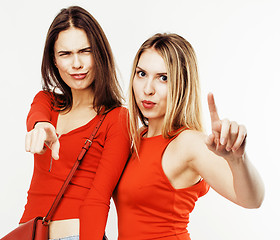 Image showing best friends teenage girls together having fun, posing emotional on white background, besties happy smiling, lifestyle people concept close up