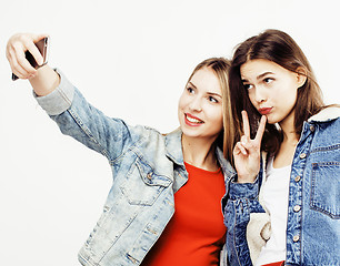 Image showing best friends teenage girls together having fun, posing emotional on white background, besties happy smiling, lifestyle people concept close up