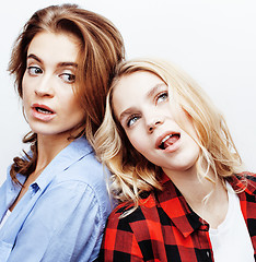 Image showing best friends teenage girls together having fun, posing emotional on white background, besties happy smiling, lifestyle people concept close up