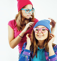 Image showing best friends teenage girls together having fun, posing emotional on white background, besties happy smiling, lifestyle people concept close up