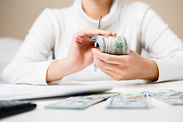 Image showing Hands counting money, close up