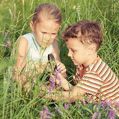 Image showing Two happy children  playing in park