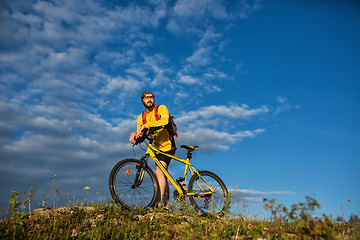 Image showing Cyclist Riding the Bike on the Trail