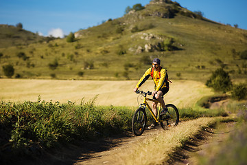 Image showing Cyclist Riding the Bike on the Trail
