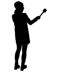 Image showing Sound technician with microphone in hand. Silhouettes on white background