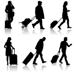 Image showing Black silhouettes travelers with suitcases on white background.
