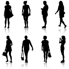 Image showing Black silhouette group of people standing in various poses