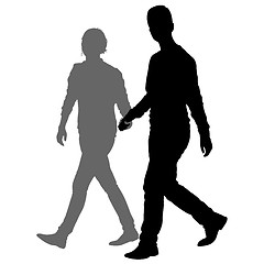 Image showing Silhouette man and woman walking hand in hand