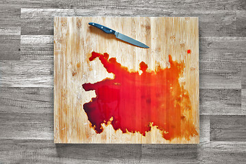 Image showing Blood on the cutting board