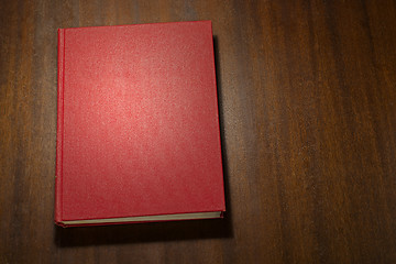 Image showing Red book on the table