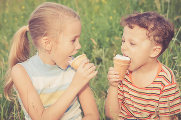 Image showing Two happy children  playing in park