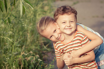 Image showing Two happy children  playing in park