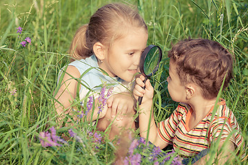 Image showing Two happy children  playing in park