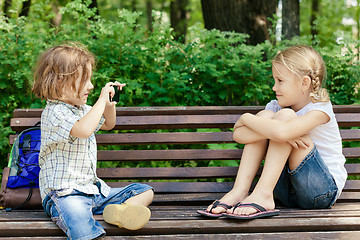 Image showing Two happy children  playing in park